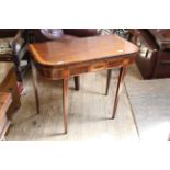 An early 19th Century inlaid mahogany tea table