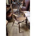 An early 20th Century beech stick back Windsor armchair