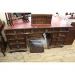 A late 19th Century mahogany leather topped pedestal desk