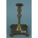 A late 17th Century Spanish brass candlestick with ring turnings,