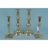 A pair of late 18th Century Adam style brass candlesticks on square bases 25cm high plus a large