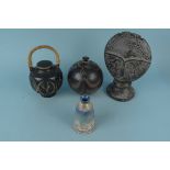 Four items of tribal pottery including a large decorated face, a squat vase,