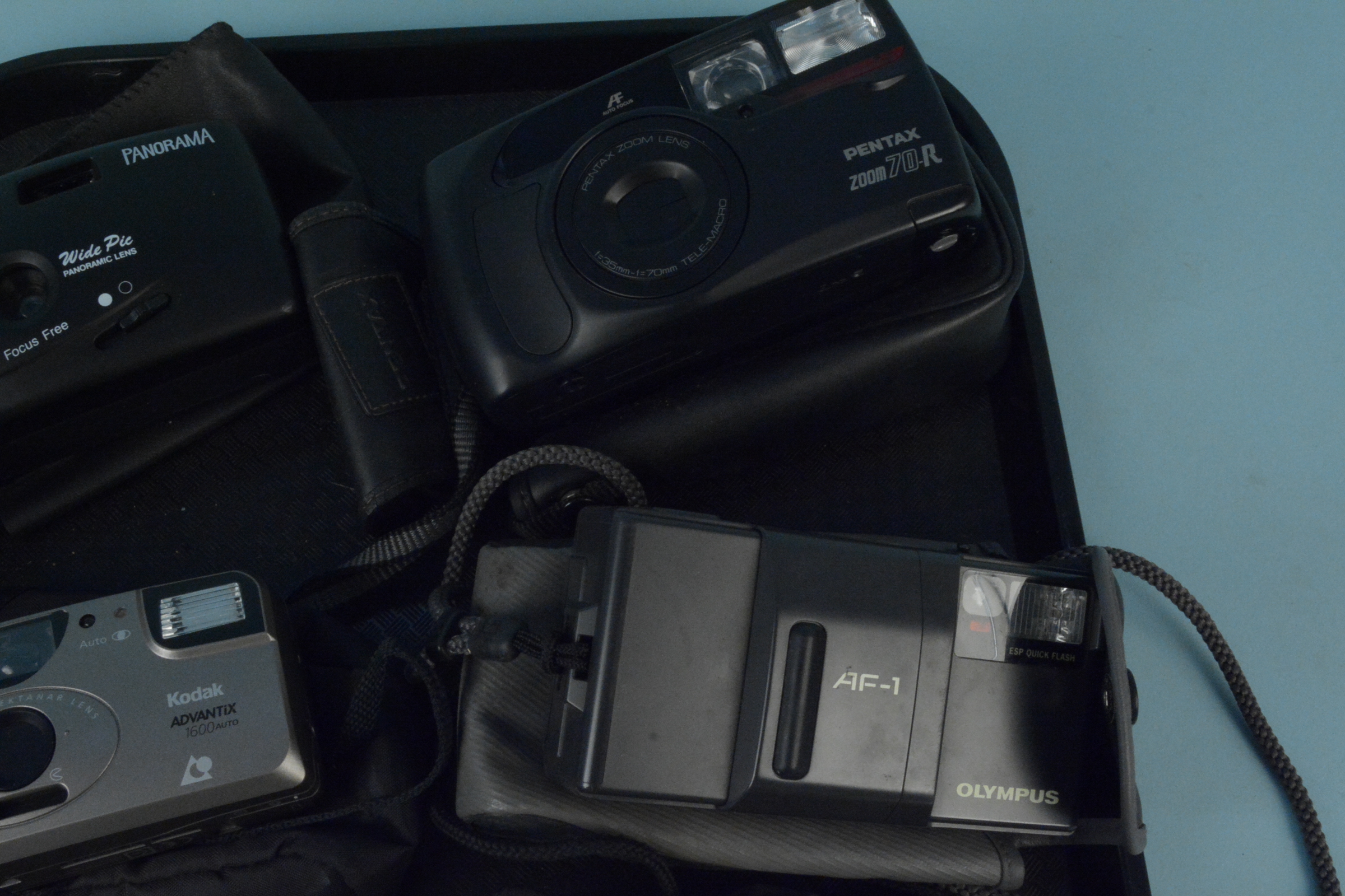 Six vintage 35mm cameras including Olympus AF-1, three Pentax, - Image 2 of 3