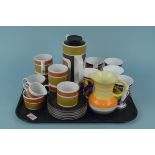 Five Clarice Cliff style Wrenn gift ware cups, a Shelley jug plus a Meakin Studio ware coffee pot,