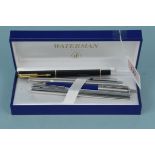 A cased Waterman ballpoint pen plus three Parker pens (one as found,