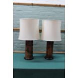 A pair of large ceramic Oriental style table lamps with shades,