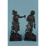 A pair of antique spelter figurines 'Passage Du Gue' and 'Bouquetiere',