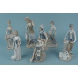 A Nao porcelain figurine of a boy with dog plus five Casades porcelain figurines (one with as found