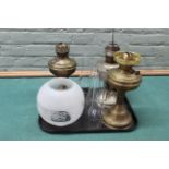 Three vintage brass oil lamps,