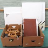Two boxes of artist's materials including a folding wooden easel, an underpining vice,