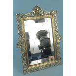 A Victorian brass dressing table mirror,