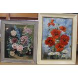 A framed still life oil of roses and delphiniums in a vase signed 'G M Haybittle',