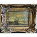 A small gilt framed antique oil on board of sailing ships, unsigned,