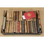 A box of vintage French literature books including Moliere