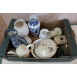 Three boxes of assorted items including glass decanters, pottery and porcelain jugs and vases,