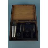 A boxed magic lantern with original oil lamp fittings plus fifteen lantern slides