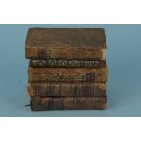 A calf bound French edition of Robin Crusoe 1768 with coloured plates,