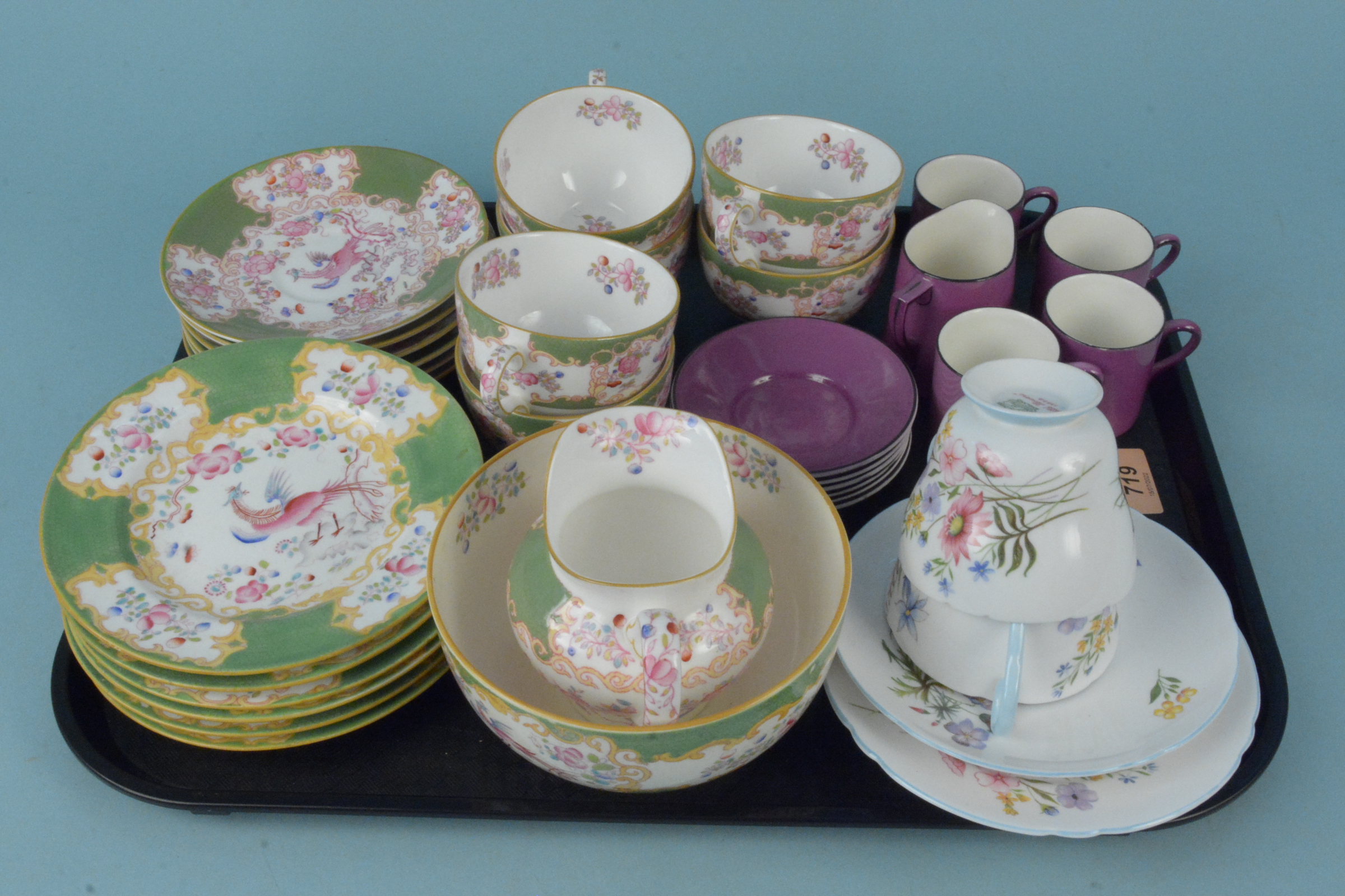 A late 19th Century Minton 'Green Cockatrice' pattern six cups and saucers,