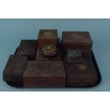 Mixed carved wooden lidded boxes,