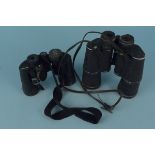 A pair of Opticron 8x40 binoculars with clear optics plus a pair of Russian 7x50 binoculars with