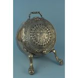 A heavy 19th Century brass and copper bound barrel shaped coal box with decorative pierced and