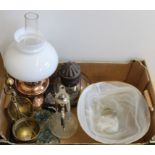 A copper oil lamp with glass shade, a vintage storm lamp, a white Art glass bowl,