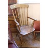 A late Victorian beech and elm stick back armchair