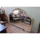 A substantial painted overmantel mirror with etched glass decoration