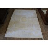A cream ground wool rug,