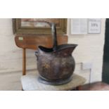A late 19th Century copper coal scuttle