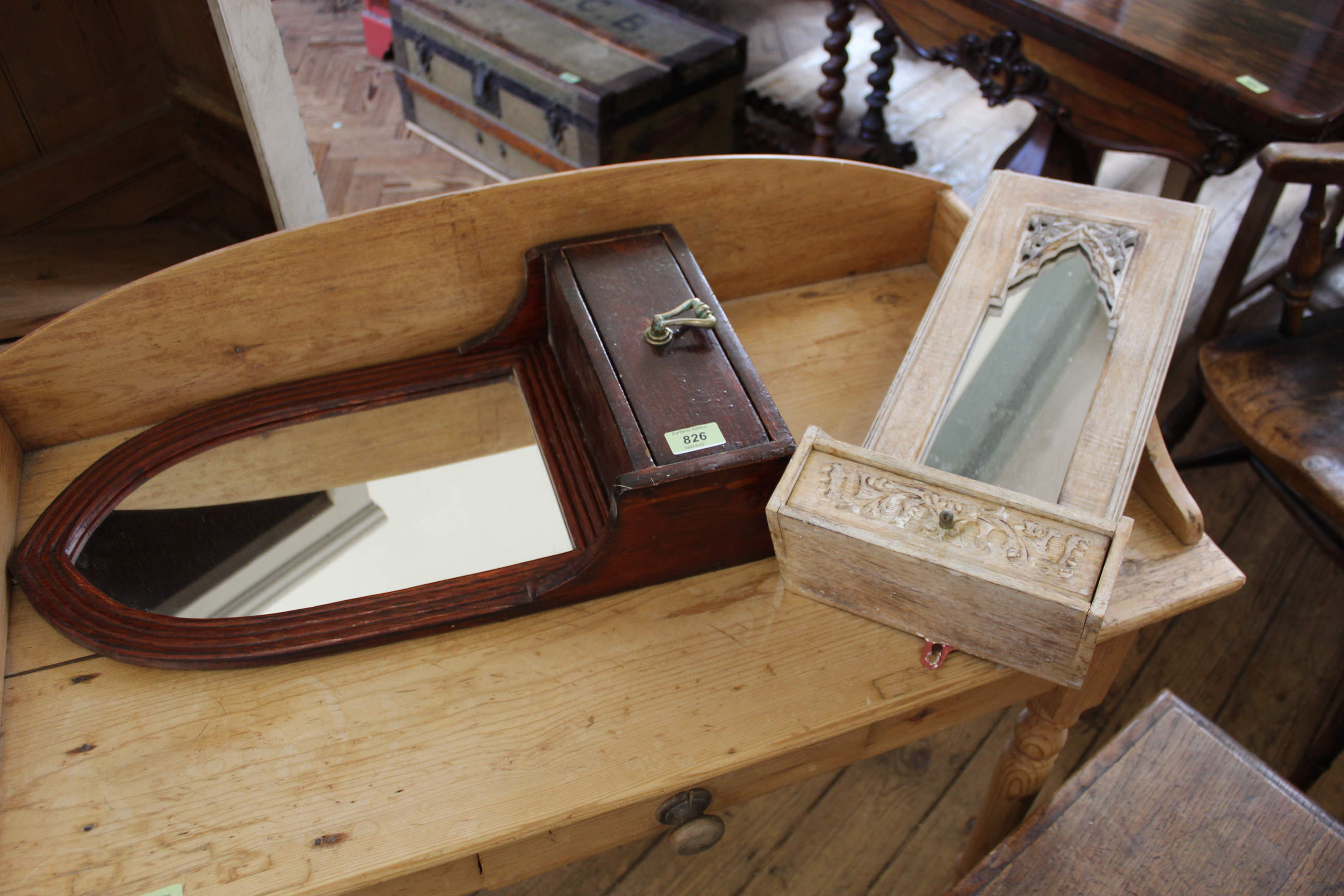 A stained pine single drawer hanging mirror,