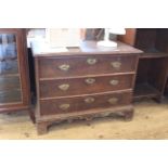 An early 19th Century oak three drawer chest