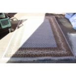 A grey ground wool rug,