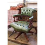 A late 20th Century leather and mahogany office chair