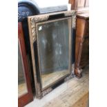A gilt decorated wall mirror
