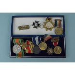 A quantity of WWII medals including the Greece war medal 1940/41 together with various medallions