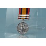 A Queens South Africa medal with two clasps, Paardeberg and Relief of Kimberley to 954 Pte W.