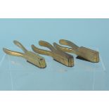 Three double cavity brass bullet moulds,