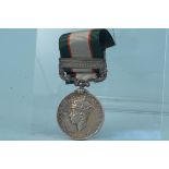 An India General Service medal with North West Frontier 1937-39 to a native