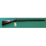 A percussion action shotgun with 32" barrel of approx 13 bore,