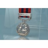 An India General Service medal with Jowaki 1877-8 clasp to 2409 Pte Thos Berry 2/9th Foot