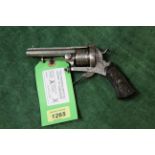 A six shot 7mm pin fire revolver with Gutta-Percha grips, single and double action working,