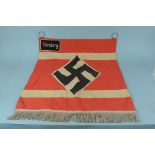 A German (PATTERN) banner with two metal rings to top and 'Nuremberg' sewn on 'patch',