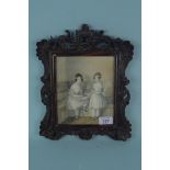 An early 19th Century framed watercolour portrait of two young girls,