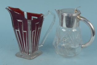 An Art Deco ruby flashed lemonade jug, a cut glass and white metal jug,