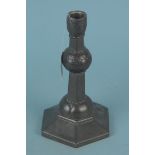 A Tudric pewter candlestick marked R D 573984 Tudric 01043 to base,