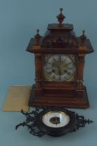 A vintage wooden cased H A C Wurttemberg chiming mantel clock,