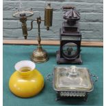 A brass table lamp, a copper finish lantern,