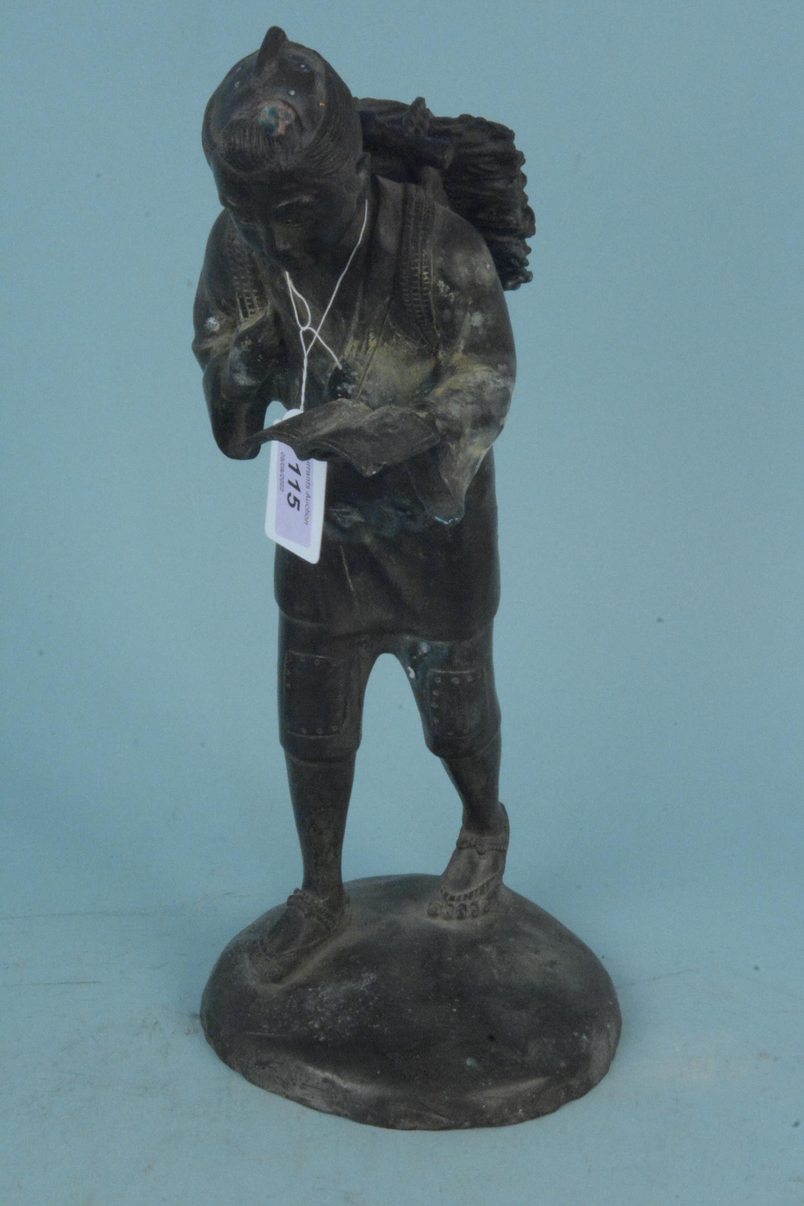 An antique Japanese bronze figure of a scholar,