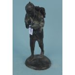 An antique Japanese bronze figure of a scholar,